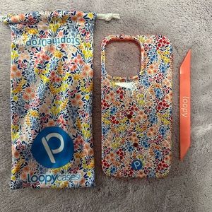 iPhone 14 pro max. Right. Spring meadows loopy case.